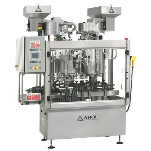 Ротационная укупорочная машина LA CHAMPENOISEмногоголовочная коронкаавтоматическая