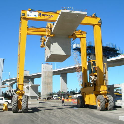 Rubber-tired straddle carrier MST 150for precast beams