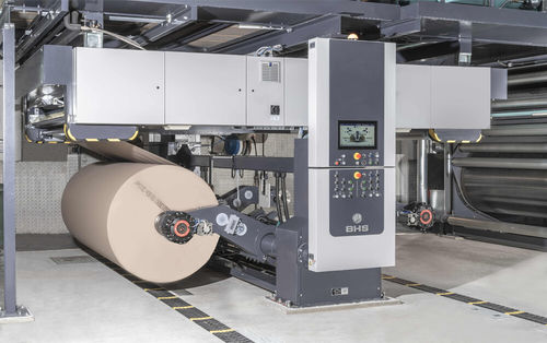 Автоматический разматыватель бумаги с моторизованным роликом