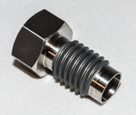 R007101427- Body, check valve, outlet, 10/25ML TI., 1/pk