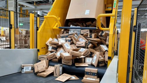 Система разгрузки контейнеров U-Care Ccageдля картонных коробокавтоматическая