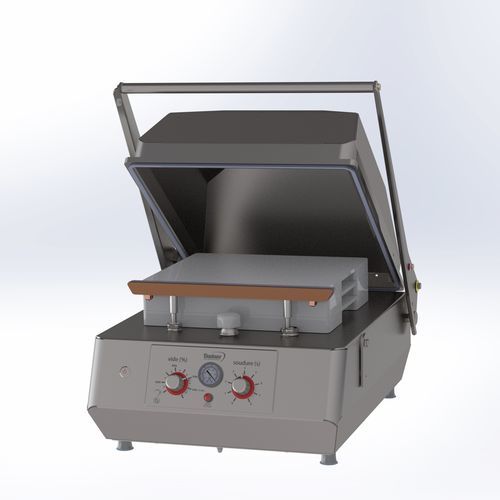 Semi-automatic packaging machine ASTORR 440 Avacuumbagfor the food industry