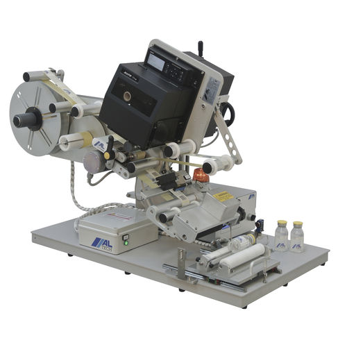 Полуавтоматический этикетировщик ALmatic Cдля тубдля бутылокдля самоклеящихся этикеток