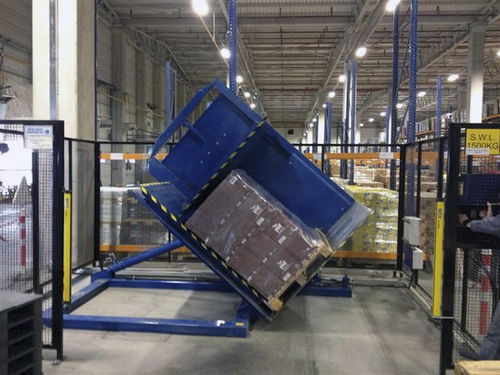 Устройство для переворачивания поддонов электрическоефиксированное