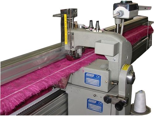 Машина для вышивания двойным цепным швом 128-02фиксированная ткань