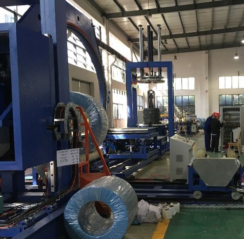 Automatic strapping machine for wire coilsverticalcompacting