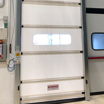 Рулонные ворота SPEEDY ROLLиз нержавеющей сталидля интерьерапромышленные