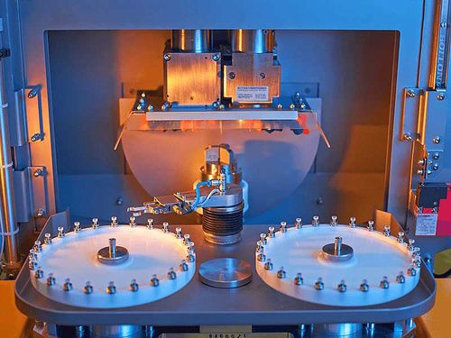 Optical lens materials handling system HS-30automatedworkpiece