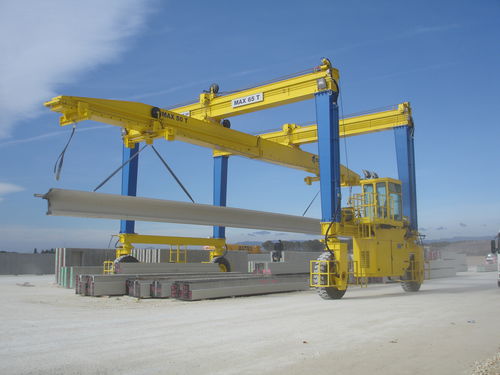 Портальный транспортер MST 65 на резиновых колесах для сборных балок