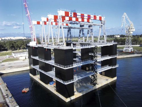 Козловой кран на резиновых колесах RGC 90для морского применения