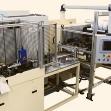 Автоматическая машина для производства шапочек непрерывного действия