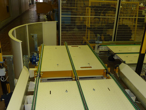 Chain conveyor for palletsfor transporttransfer