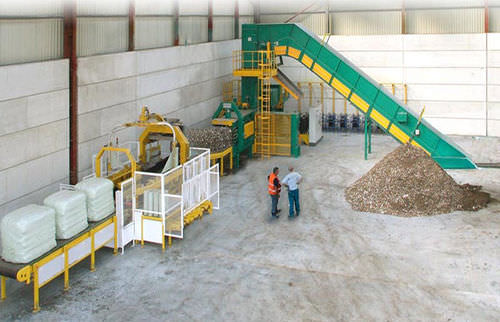 Автоматическая обмоточная машина для пакетированных отходов