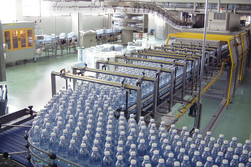 Automatic feeder-positioner for bottles