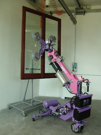 Pneumatic manipulator with suction cuppositioningunloading