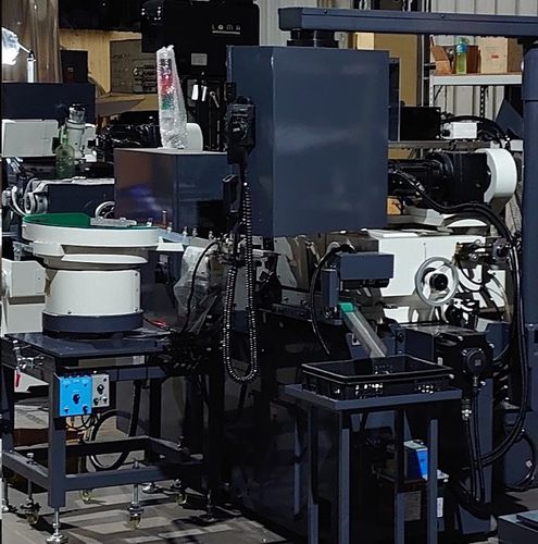 Устройство подачи бесцентрово-шлифовального станка автоматизированное