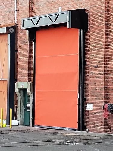 Рулонные ворота FasTrax® XLтканьвысокоскоростнаябезопасность