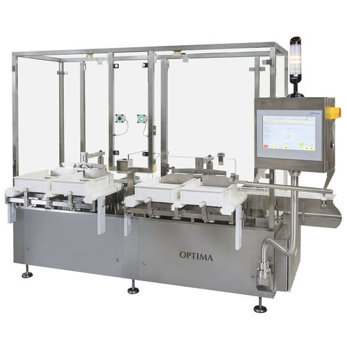 Упаковщик лотков прерывистого действия OPTIMA M для флаконов