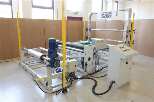 Моторизованный ролик перемотки-намотки пленки