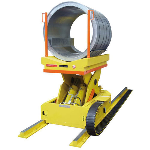 Загрузочная тележка с металлическим катушкодержателемна рельсе